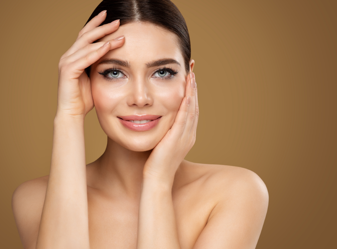 A woman with radiant and youthful skin after receiving Sculptra injections.